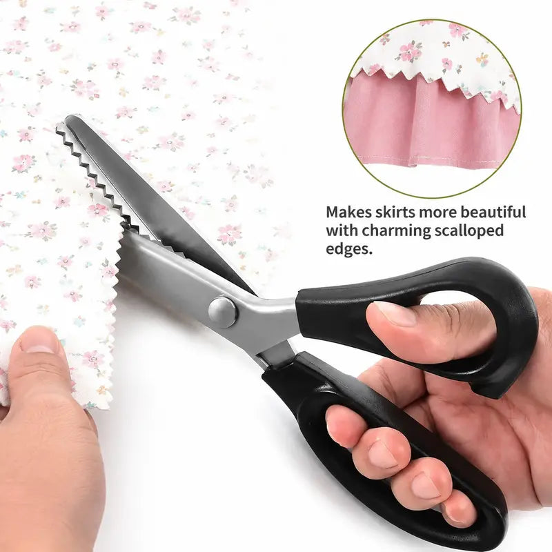 Pinking shears cutting a scalloped decorative edge on floral fabric